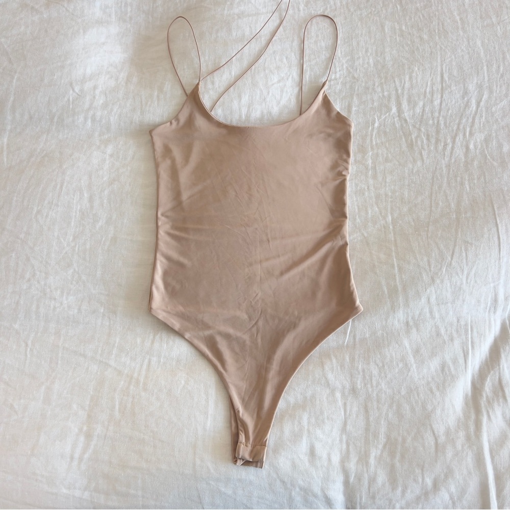 MISSY EMPIRE Asymmetrical Strappy One Piece Bodysuit in nude stone